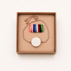 Tiny Moments Geurarmband in open sierradendoosje met viltjes