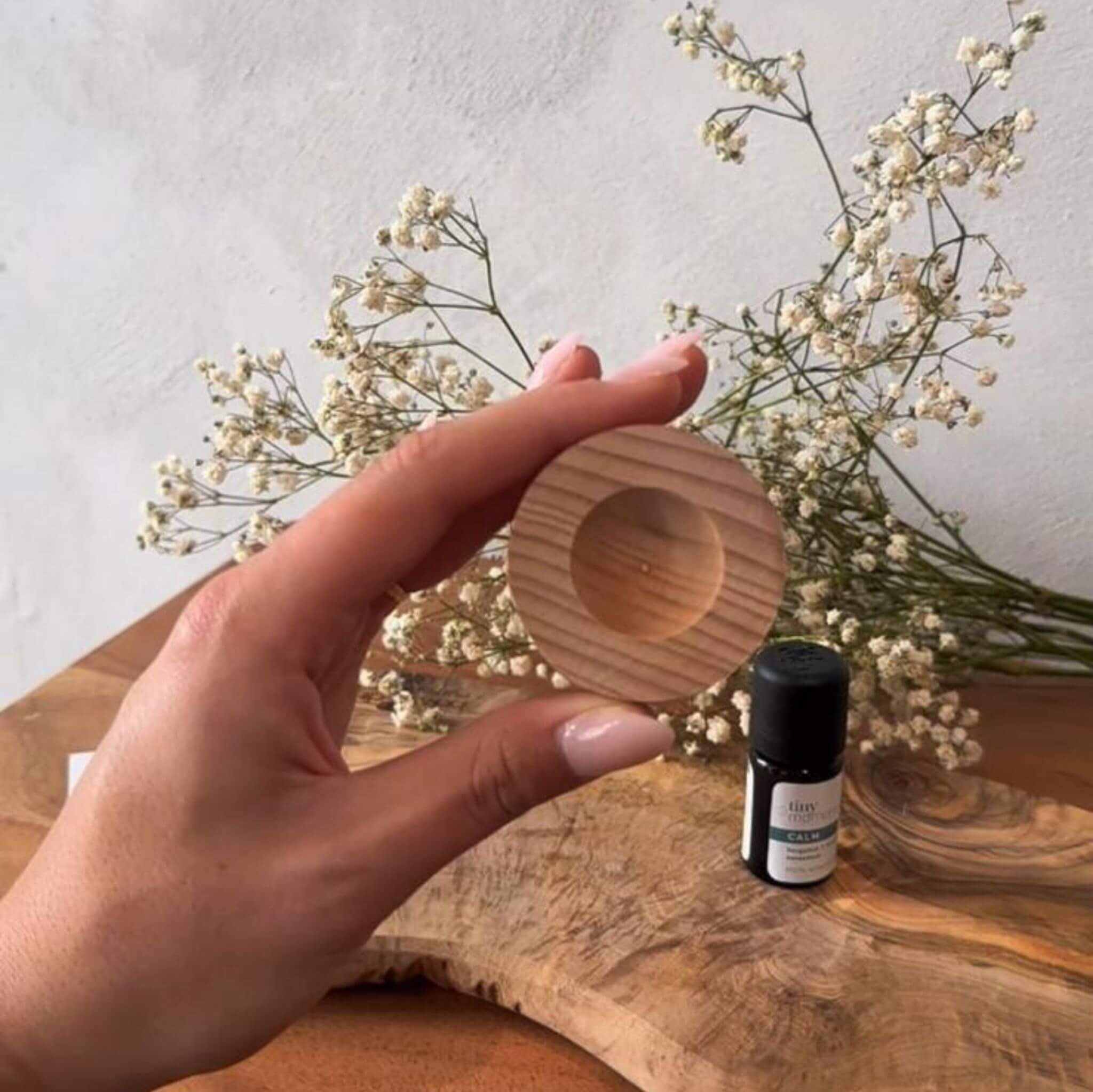 Tiny Moments Pocket Diffuser in hand