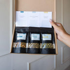Tiny Tea Tasting open doos in hand