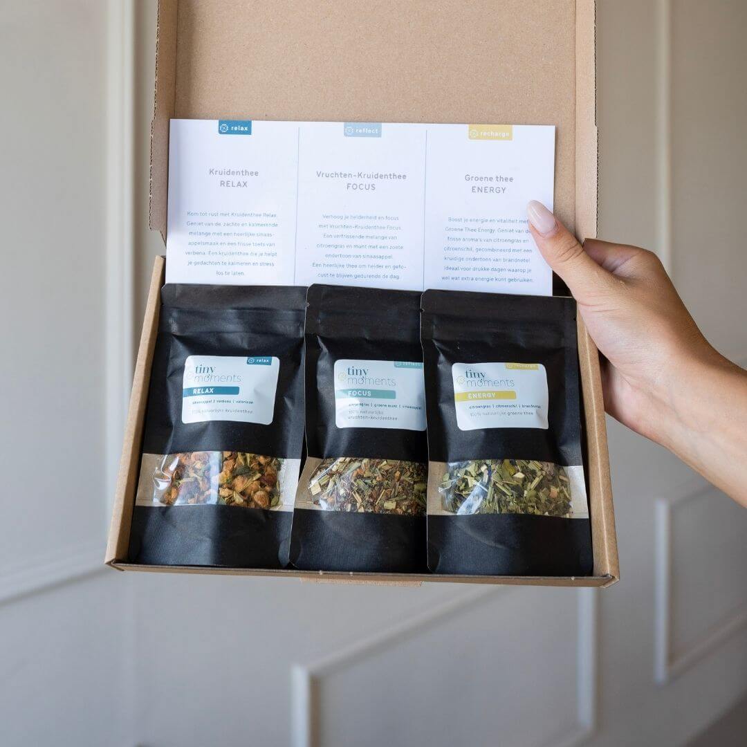 Tiny Tea Tasting open doos in hand